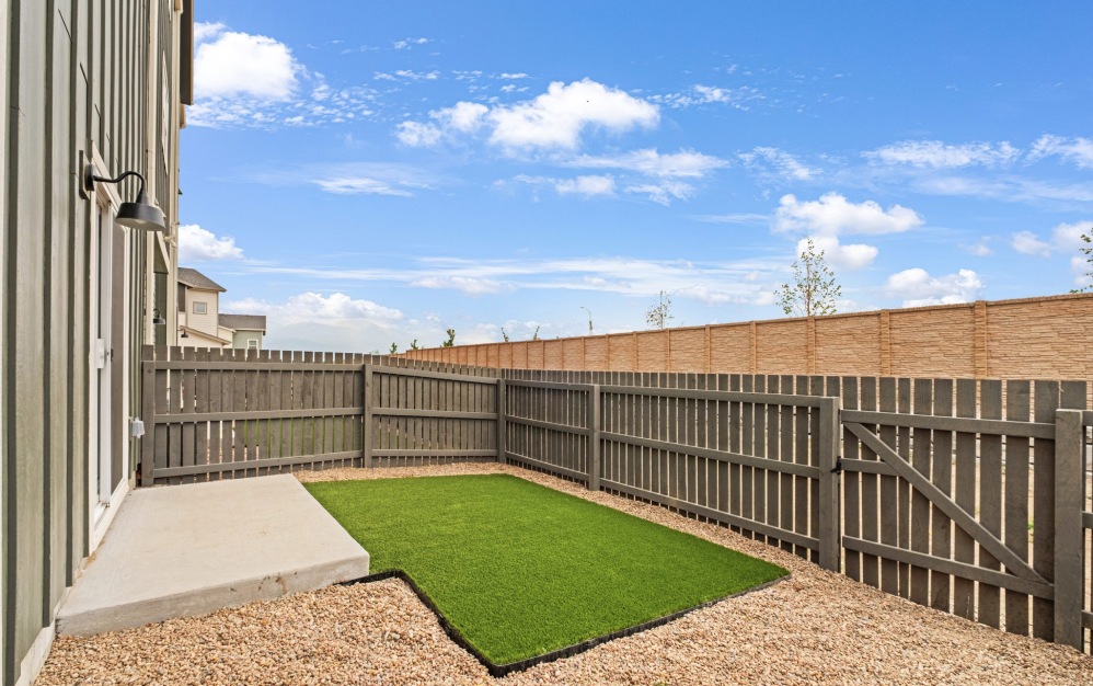 Backyard with turf at The Selby