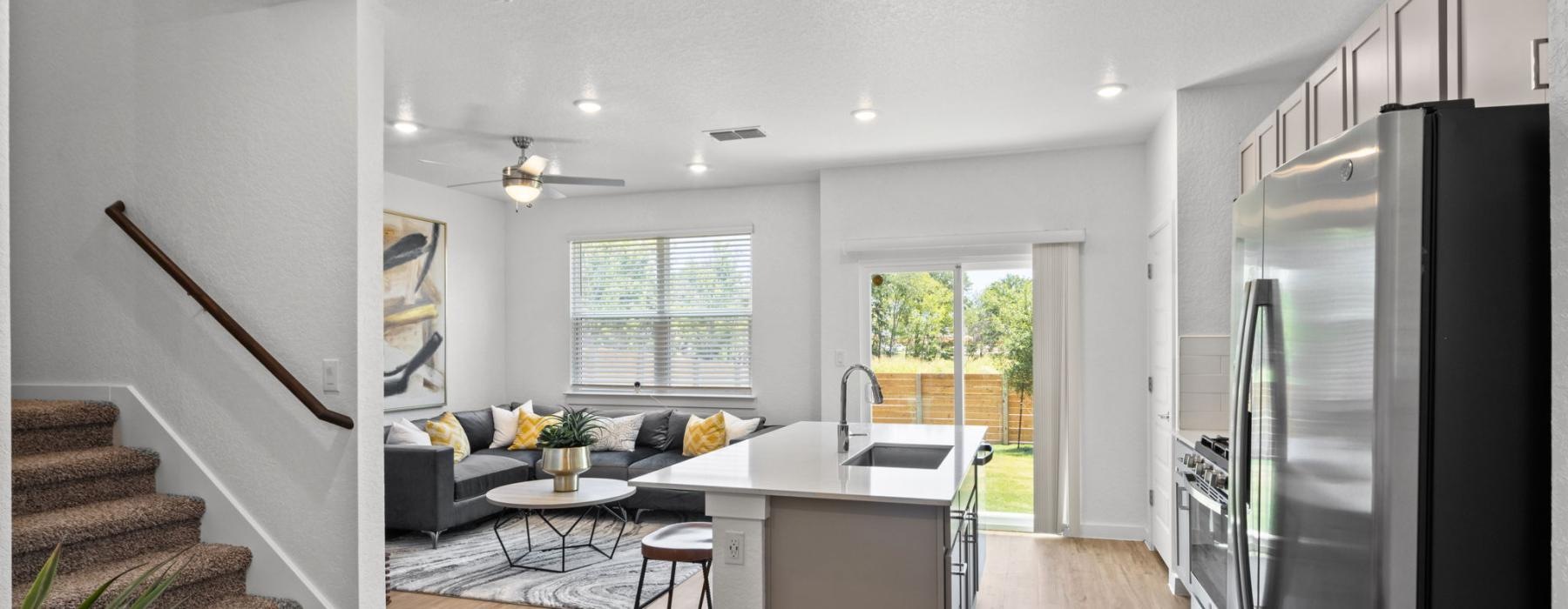 a kitchen and living room