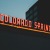 neon sign at dusk
