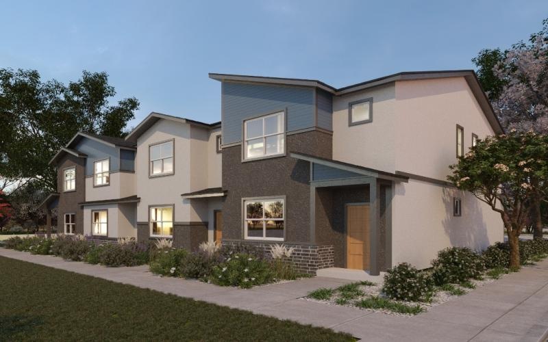 a row of houses with driveways